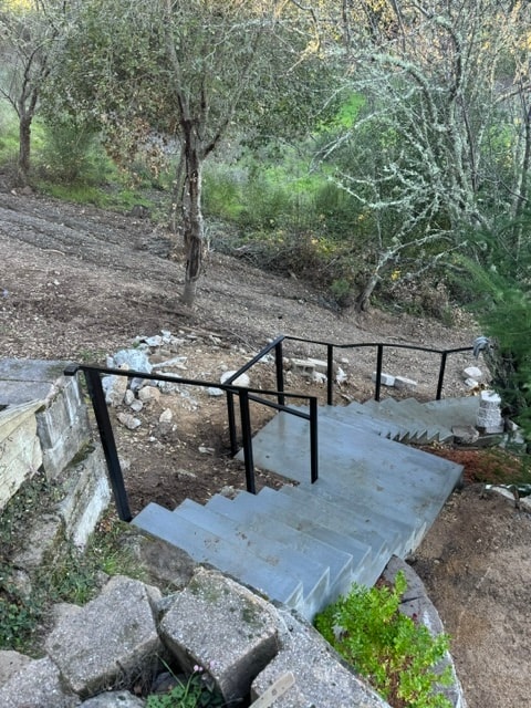Outdoor Steel Handrail on Concrete Steps